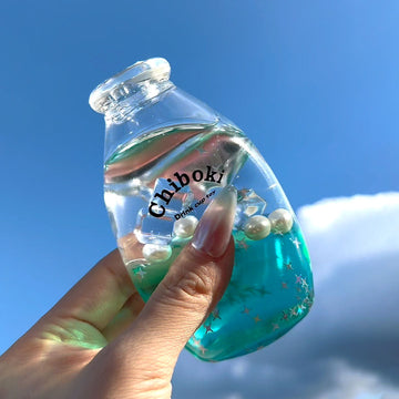 Blue soda bottle squeeze toy