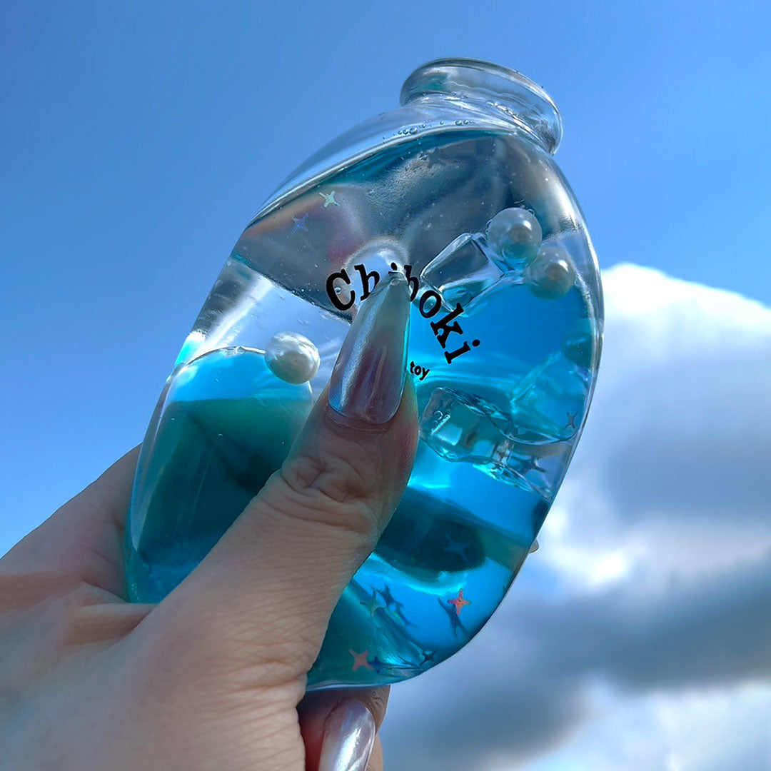 Blue soda bottle squeeze toy